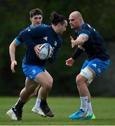 5 April 2021; James Lowe, left, and Rhys Ruddock during Leinster Rugby squad training at UCD in Dublin. Photo by Ramsey Cardy/Sportsfile