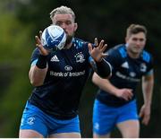 5 April 2021; Andrew Porter, left, and Jordan Larmour during Leinster Rugby squad training at UCD in Dublin. Photo by Ramsey Cardy/Sportsfile