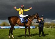 5 April 2021; Jockey Ricky Doyle celebrates on Freewheelin Dylan with stablehand Molly O'Connor after winning the BoyleSports Irish Grand National Steeplechase during day three of the Fairyhouse Easter Festival at the Fairyhouse Racecourse in Ratoath, Meath. Photo by Harry Murphy/Sportsfile