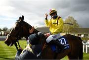 5 April 2021; Jockey Ricky Doyle celebrates on Freewheelin Dylan after winning the BoyleSports Irish Grand National Steeplechase during day three of the Fairyhouse Easter Festival at the Fairyhouse Racecourse in Ratoath, Meath. Photo by Harry Murphy/Sportsfile