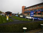 5 April 2021; Jockey Ricky Doyle celebrates with the trophy in an empty winners enclosure after riding Freewheelin Dylan to win the BoyleSports Irish Grand National Steeplechase during day three of the Fairyhouse Easter Festival at the Fairyhouse Racecourse in Ratoath, Meath. Photo by Harry Murphy/Sportsfile