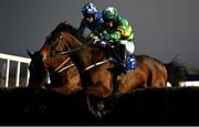 5 April 2021; Uisce Beatha, with Simon Torrens up, right, jump the last ahead of Lord Lariat, with Jody McGarvey up, on their way to winning the Fred Kenny Lifetime Service To Racing Handicap Steeplechase during day three of the Fairyhouse Easter Festival at the Fairyhouse Racecourse in Ratoath, Meath. Photo by Harry Murphy/Sportsfile