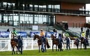 5 April 2021; Runners and riders parade to an empty grand stand prior to the BoyleSports Irish Grand National Steeplechase during day three of the Fairyhouse Easter Festival at the Fairyhouse Racecourse in Ratoath, Meath. Photo by Harry Murphy/Sportsfile