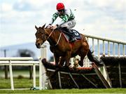 5 April 2021; The Bosses Oscar, with Jack Kennedy up, jumps the last on their way to finishing sixth in the Underwriting Exchange Hurdle during day three of the Fairyhouse Easter Festival at the Fairyhouse Racecourse in Ratoath, Meath. Photo by Harry Murphy/Sportsfile