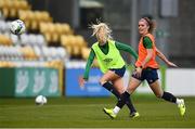 7 April 2021; Denise O'Sullivan and Jamie Finn, right, during a Republic of Ireland training session at Tallaght Stadium in Dublin. Photo by Stephen McCarthy/Sportsfile
