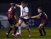 9 April 2021; Patrick McEleney of Dundalk in action against Keith Buckley, right, and Tyreke Wilson of Bohemians during the SSE Airtricity League Premier Division match between Dundalk and Bohemians at Oriel Park in Dundalk, Louth. Photo by Ben McShane/Sportsfile