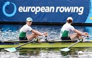 10 April 2021; Fintan McCarthy, left, and Paul O'Donovan of Ireland head to the start of their A/B semi-final of the Lightweight Men's Double Sculls during Day 2 of the European Rowing Championships 2021 at Varese in Italy. Photo by Roberto Bregani/Sportsfile