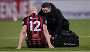 9 April 2021; Bohemians physiotherapist Dr Paul Kirwan gives medical attention to Georgie Kelly of Bohemians during the SSE Airtricity League Premier Division match between Dundalk and Bohemians at Oriel Park in Dundalk, Louth. Photo by Stephen McCarthy/Sportsfile