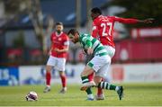 10 April 2021; Chris McCann of Shamrock Rovers in action against Romeo Parkes of Sligo Rovers during the SSE Airtricity League Premier Division match between Sligo Rovers and Shamrock Rovers at The Showgrounds in Sligo. Photo by Stephen McCarthy/Sportsfile
