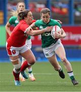 10 April 2021; Eve Higgins of Ireland is tackled by Siwan Lillicrap of Wales during the Women's Six Nations Rugby Championship match between Wales and Ireland at Cardiff Arms Park in Cardiff, Wales. Photo by Chris Fairweather/Sportsfile