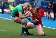 10 April 2021; Dorothy Wall of Ireland is tackled by Caryl Thomas of Wales on her way to scoring a try during the Women's Six Nations Rugby Championship match between Wales and Ireland at Cardiff Arms Park in Cardiff, Wales. Photo by Chris Fairweather/Sportsfile