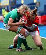 10 April 2021; Dorothy Wall of Ireland is tackled by Caryl Thomas of Wales on her way to scoring a try during the Women's Six Nations Rugby Championship match between Wales and Ireland at Cardiff Arms Park in Cardiff, Wales. Photo by Chris Fairweather/Sportsfile