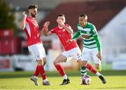 10 April 2021; Graham Burke of Shamrock Rovers in action against Greg Bolger, left, and Robbie McCourt of Sligo Rovers during the SSE Airtricity League Premier Division match between Sligo Rovers and Shamrock Rovers at The Showgrounds in Sligo. Photo by Stephen McCarthy/Sportsfile