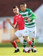 10 April 2021; Graham Burke of Shamrock Rovers in action against Robbie McCourt of Sligo Rovers during the SSE Airtricity League Premier Division match between Sligo Rovers and Shamrock Rovers at The Showgrounds in Sligo. Photo by Stephen McCarthy/Sportsfile