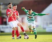 10 April 2021; Graham Burke of Shamrock Rovers in action against Greg Bolger, left, and Robbie McCourt of Sligo Rovers during the SSE Airtricity League Premier Division match between Sligo Rovers and Shamrock Rovers at The Showgrounds in Sligo. Photo by Stephen McCarthy/Sportsfile