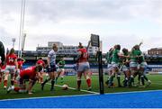 10 April 2021; Dorothy Wall of Ireland celebrates with team-mates after scoring a try during the Women's Six Nations Rugby Championship match between Wales and Ireland at Cardiff Arms Park in Cardiff, Wales. Photo by Chris Fairweather/Sportsfile