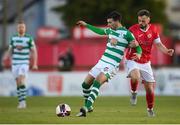 10 April 2021; Danny Mandroiu of Shamrock Rovers in action against Greg Bolger of Sligo Rovers during the SSE Airtricity League Premier Division match between Sligo Rovers and Shamrock Rovers at The Showgrounds in Sligo. Photo by Stephen McCarthy/Sportsfile
