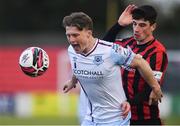10 April 2021; Daniel O'Reilly of Drogheda United in action against Rob Manley of Longford Town during the SSE Airtricity League Premier Division match between Longford Town and Drogheda United at Bishopsgate in Longford. Photo by Sam Barnes/Sportsfile