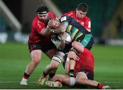 10 April 2021; Teimana Harrison of Northampton Saints is tackled by Rob Herring, Marty Moore and Nick Timoney of Ulster during the Heineken Challenge Cup Quarter-Final match between Northampton Saints and Ulster at Franklin's Gardens in Northampton, England. Photo by Matt Impey/Sportsfile