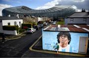 12 April 2021; Local resident Johnny Figo Murphy, age 9, from Dublin shows his skills in front of a mural by Dublin artist Chelsea Jacobs depicting the late Argentine footballer Diego Maradona at Havelock Square in Dublin. Photo by David Fitzgerald/Sportsfile