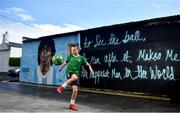 12 April 2021; Local resident Johnny Figo Murphy, age 9, from Sandymount in Dublin practices his skills in front of a mural by Dublin artist Chelsea Jacobs depicting the late Argentine footballer Diego Maradona at Havelock Square in Dublin. Photo by David Fitzgerald/Sportsfile
