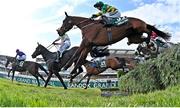 10 April 2020; Minella Times, with Rachael Blackmore up, take the water jump trailing Burrows Saint, with Paddy Mullins up, on their way to winning the Randox Grand National at the Aintree Racecourse in Liverpool, England. Photo by Hugh Routledge/Sportsfile