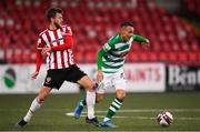 13 April 2021; Graham Burke of Shamrock Rovers in action against Will Patching of Derry City during the SSE Airtricity League Premier Division match between Derry City and Shamrock Rovers at the Ryan McBride Brandywell Stadium in Derry. Photo by Stephen McCarthy/Sportsfile