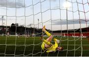 13 April 2021; Derry City goalkeeper Nathan Gartside fails to save the shot of Graham Burke of Shamrock Rovers to concede his side's second goal during the SSE Airtricity League Premier Division match between Derry City and Shamrock Rovers at the Ryan McBride Brandywell Stadium in Derry. Photo by Stephen McCarthy/Sportsfile