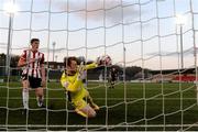 13 April 2021; Derry City goalkeeper Nathan Gartside fails to stop the shot of Rory Gaffney of Shamrock Rovers to concede his side's first goal during the SSE Airtricity League Premier Division match between Derry City and Shamrock Rovers at the Ryan McBride Brandywell Stadium in Derry. Photo by Stephen McCarthy/Sportsfile