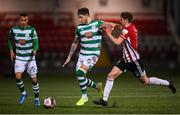 13 April 2021; Lee Grace of Shamrock Rovers in action against Ronan Boyce of Derry City during the SSE Airtricity League Premier Division match between Derry City and Shamrock Rovers at the Ryan McBride Brandywell Stadium in Derry. Photo by Stephen McCarthy/Sportsfile