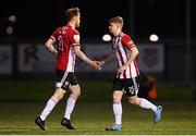 13 April 2021; Caoimhin Porter of Derry City comes on to make his debut, substituting for team-mate Cameron McJannet, left, during the SSE Airtricity League Premier Division match between Derry City and Shamrock Rovers at the Ryan McBride Brandywell Stadium in Derry. Photo by Stephen McCarthy/Sportsfile