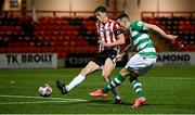 13 April 2021; Aaron Greene of Shamrock Rovers in action against Eoin Toal of Derry City during the SSE Airtricity League Premier Division match between Derry City and Shamrock Rovers at the Ryan McBride Brandywell Stadium in Derry. Photo by Stephen McCarthy/Sportsfile