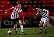 13 April 2021; Will Patching of Derry City in action against Gary O'Neill of Shamrock Rovers during the SSE Airtricity League Premier Division match between Derry City and Shamrock Rovers at the Ryan McBride Brandywell Stadium in Derry. Photo by Stephen McCarthy/Sportsfile