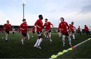 16 April 2021; Derry City players warm-up before the SSE Airtricity League Premier Division match between Derry City and Drogheda United at the Ryan McBride Brandywell Stadium in Derry. Photo by Stephen McCarthy/Sportsfile