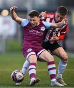 16 April 2021; Chris Lyons of Drogheda United in action against Jack Malone of Derry City during the SSE Airtricity League Premier Division match between Derry City and Drogheda United at the Ryan McBride Brandywell Stadium in Derry. Photo by Stephen McCarthy/Sportsfile