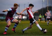 16 April 2021; Brendan Barr of Derry City in action against Hugh Douglas of Drogheda United during the SSE Airtricity League Premier Division match between Derry City and Drogheda United at the Ryan McBride Brandywell Stadium in Derry. Photo by Stephen McCarthy/Sportsfile