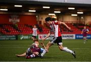 16 April 2021; Brendan Barr of Derry City in action against Hugh Douglas of Drogheda United during the SSE Airtricity League Premier Division match between Derry City and Drogheda United at the Ryan McBride Brandywell Stadium in Derry. Photo by Stephen McCarthy/Sportsfile
