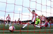 16 April 2021; James Brown of Drogheda United shoots to score his side's first goal past Derry City players, including Ciarán Coll, during the SSE Airtricity League Premier Division match between Derry City and Drogheda United at the Ryan McBride Brandywell Stadium in Derry. Photo by Stephen McCarthy/Sportsfile