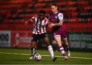 16 April 2021; James Akintunde of Derry City in action against Jack Tuite of Drogheda United during the SSE Airtricity League Premier Division match between Derry City and Drogheda United at the Ryan McBride Brandywell Stadium in Derry. Photo by Stephen McCarthy/Sportsfile