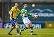 17 April 2021; Chris McCann of Shamrock Rovers in action against Shane Elworthy of Longford Town during the SSE Airtricity League Premier Division match between Shamrock Rovers and Longford Town at Tallaght Stadium in Dublin. Photo by Eóin Noonan/Sportsfile