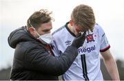 17 April 2021; Ole Erik Midtskogen of Dundalk receives treatment from Dr Dualtach Mac Colgáin, Dundalk team doctor, during the SSE Airtricity League Premier Division match between Dundalk and St Patrick's Athletic at Oriel Park in Dundalk, Louth. Photo by Stephen McCarthy/Sportsfile