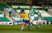 17 April 2021; Graham Burke of Shamrock Rovers in action against Karl Chambers of Longford Town during the SSE Airtricity League Premier Division match between Shamrock Rovers and Longford Town at Tallaght Stadium in Dublin. Photo by Eóin Noonan/Sportsfile