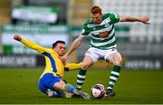 17 April 2021; Rory Gaffney of Shamrock Rovers is tackled by Karl Chambers of Longford Town during the SSE Airtricity League Premier Division match between Shamrock Rovers and Longford Town at Tallaght Stadium in Dublin. Photo by Eóin Noonan/Sportsfile