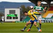 17 April 2021; Karl Chambers of Longford Town in action against Liam Scales of Shamrock Rovers during the SSE Airtricity League Premier Division match between Shamrock Rovers and Longford Town at Tallaght Stadium in Dublin. Photo by Eóin Noonan/Sportsfile