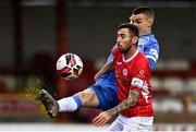 17 April 2021; Robbie McCourt of Sligo Rovers in action against Sean Boyd of Finn Harps during the SSE Airtricity League Premier Division match between Sligo Rovers and Finn Harps at The Showgrounds in Sligo. Photo by Piaras Ó Mídheach/Sportsfile