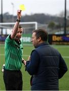 17 April 2021; Referee Damien MacGraith shows a yellow card to St Patrick's Athletic assistant manager Patrick Cregg during the SSE Airtricity League Premier Division match between Dundalk and St Patrick's Athletic at Oriel Park in Dundalk, Louth. Photo by Stephen McCarthy/Sportsfile