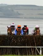 18 April 2021; Runners and riders, including Spyglass Hill, with Rachael Blackmore up, second left, approach the third fence in the Tramore Racecourse Directors Steeplechase at Tramore Racecourse in Waterford. Photo by Harry Murphy/Sportsfile