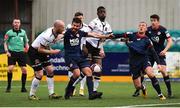 17 April 2021; Dundalk players Chris Shields, left, and Junior Ogedi-Uzokwe tussle for possession against St Patrick's Athletic players Robbie Benson, second from left, and John Mountney during the SSE Airtricity League Premier Division match between Dundalk and St Patrick's Athletic at Oriel Park in Dundalk, Louth. Photo by Ben McShane/Sportsfile