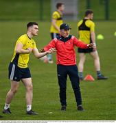 19 April 2021; Manager Mickey Harte with Matt Corcoran during senior football squad training at the Louth GAA Centre of Excellence in Louth. Following approval from the GAA and the Irish Government, the GAA released its safe return to play protocols, allowing full contact inter-county training at adult level can re-commence from April 19th. Photo by Ramsey Cardy/Sportsfile