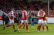 20 April 2021; Darragh Burns, second right, celebrates with St Patrick's Athletic teammates after scoring his side's first goal during the SSE Airtricity League Premier Division match between St Patrick's Athletic and Waterford at Richmond Park in Dublin. Photo by Harry Murphy/Sportsfile